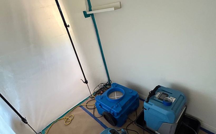Containment and drying equipment set up on a job